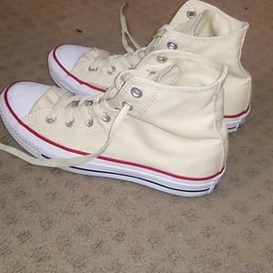 Tan high-top chuck taylors